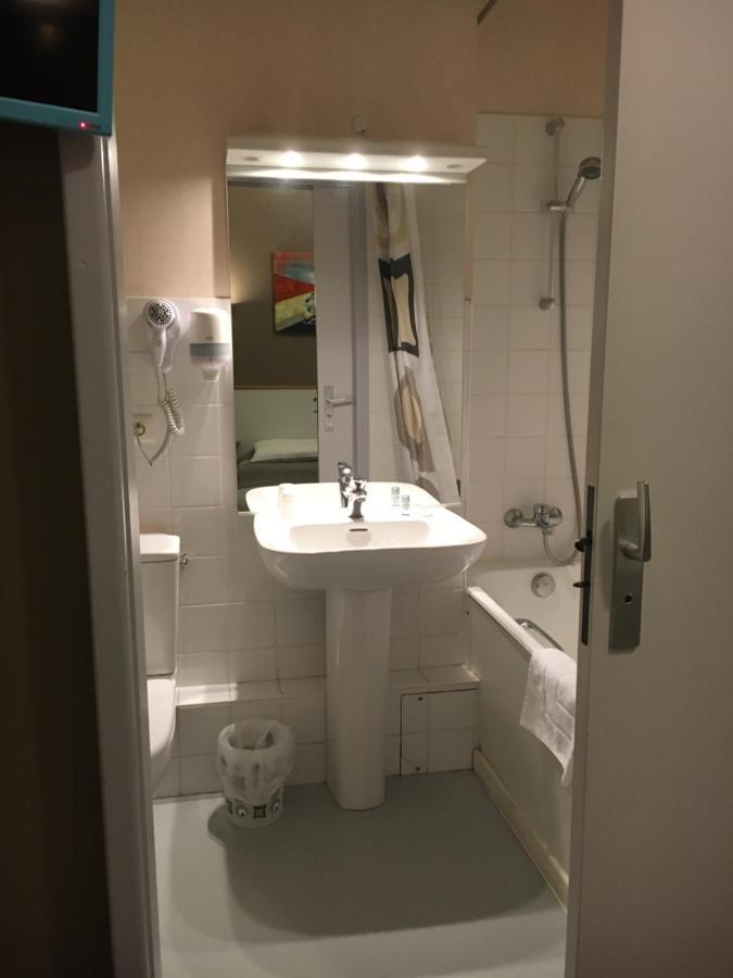 Hotel Du Centre Геньон Экстерьер фото